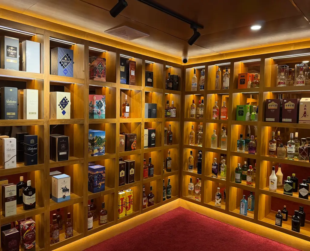 The Landmark spirits wall — whisky, cognac, gin, vodka