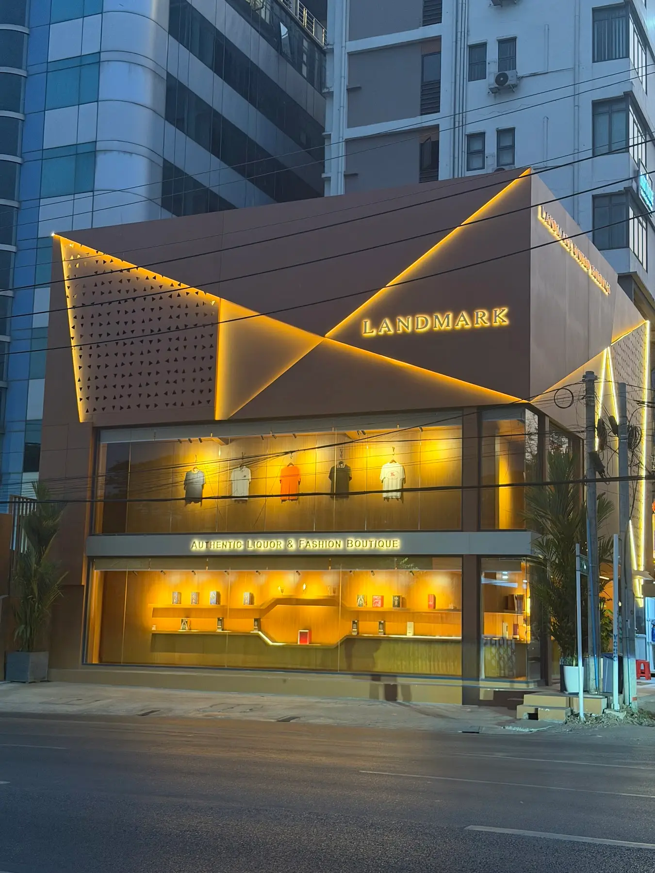 Landmark boutique storefront in Yangon at dusk